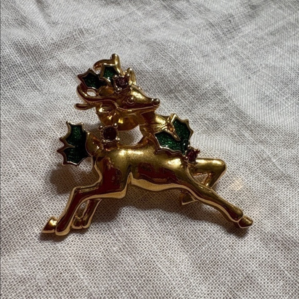 Vintage avon Festive Gold Reindeer Brooch with Green and Red Accents